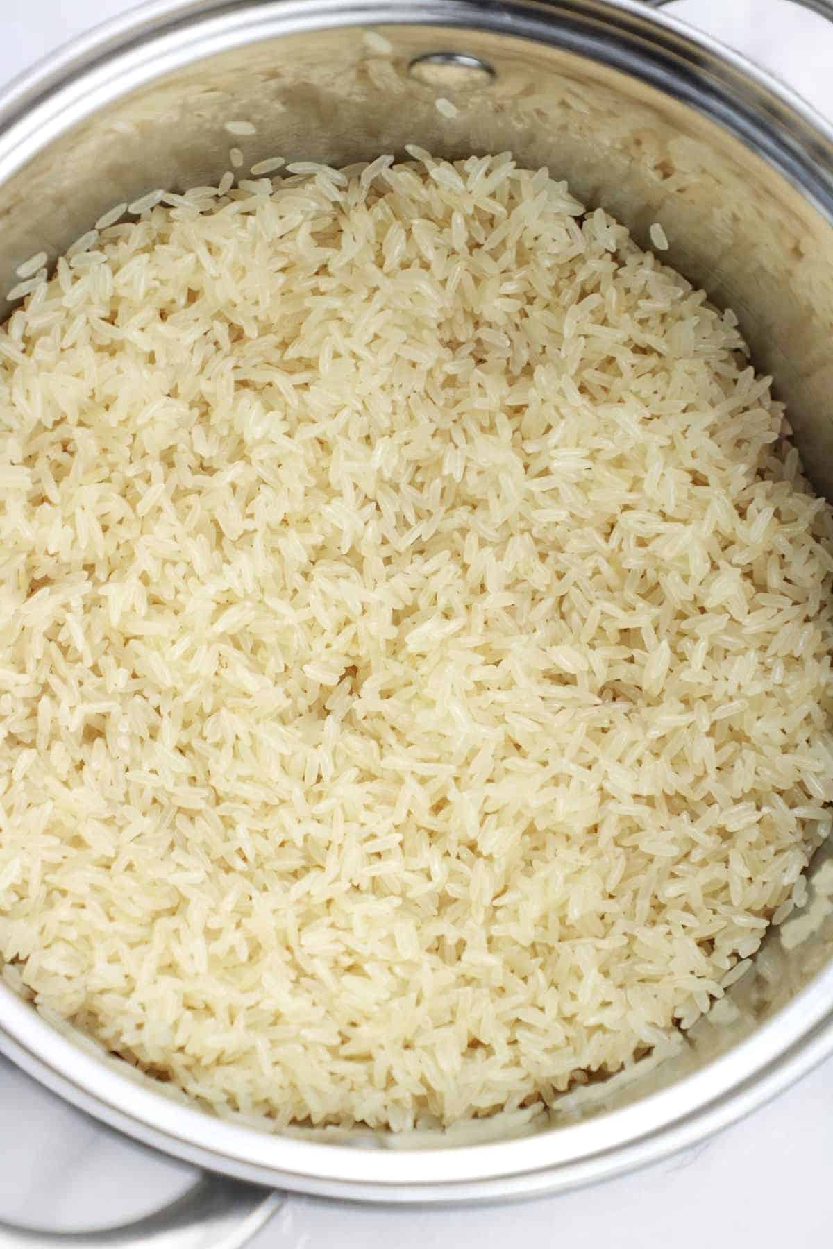 toasting rice in the pot.
