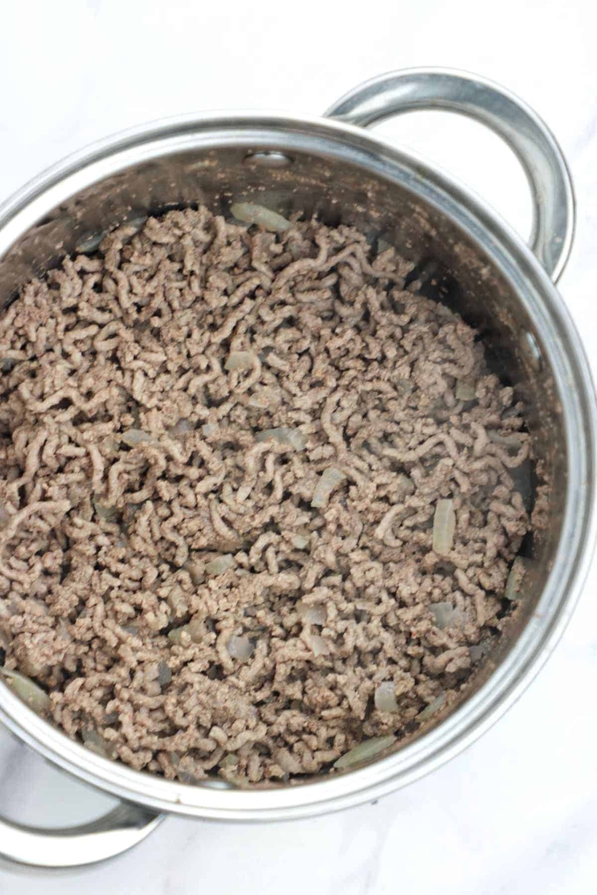 boiled ground beef in a pot.